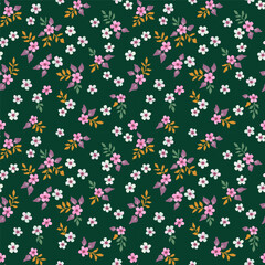 A pattern with spring flowers of light pink, light mint flowers on a dark green background.