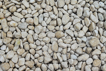 Full frame of clean white pebbles closeup