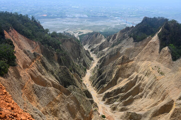 Flaming Mountain is located at the junction of Sanyi Township and Yuanli Township in Miaoli County, Taiwan.