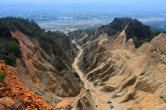 Flaming Mountain is located at the junction of Sanyi Township and Yuanli Township in Miaoli County, Taiwan.