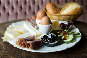 Plate with toast and ham at breakfast time