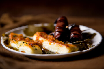 Baked halloumi cheese served with toasts.