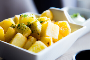 French Fries are potatoes that are made by cutting them into batons and frying them in hot oil until golden brown and crisp.