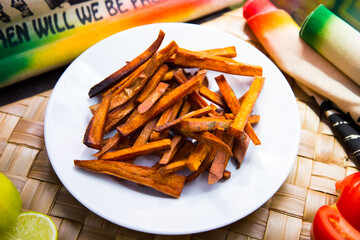 French Fries are potatoes that are made by cutting them into batons and frying them in hot oil until golden brown and crisp.