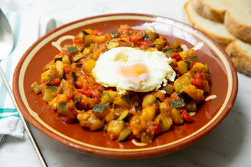 Manchego Pisto, also known simply as ratatouille, is a traditional dish from La Mancha that consists of a fry of various vegetables and egg