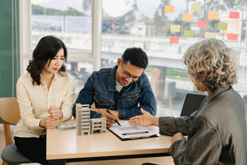 Customers who choose to buy a condominium room and a bank approve a loan for their purchase. Condominium and house loan interest rate from bank concept.