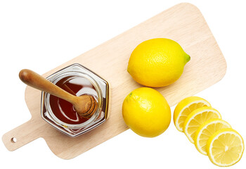 Honey, fresh lemon and cutting board
