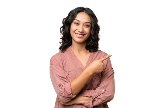 Young Argentinian woman over isolated background pointing to the side to present a product