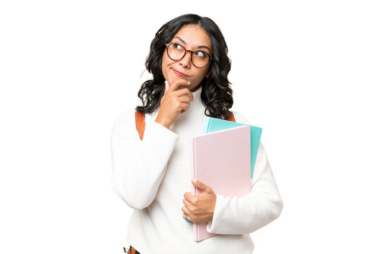 Young Argentinian student woman over isolated background having doubts and thinking