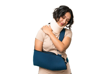Young argentinian woman wearing neck brace and sling over isolated background suffering from pain...