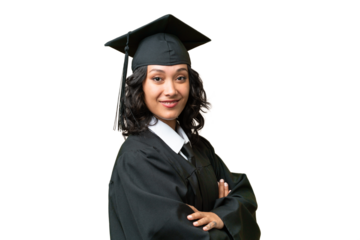Young university graduate Argentinian woman over isolated background with arms crossed and looking forward