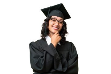 Young university graduate Argentinian woman over isolated background with glasses and smiling
