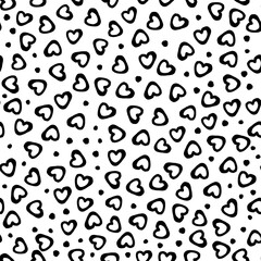 Seamless pattern of hand drawn hearts-illustration. Monochrome black ornament dots.