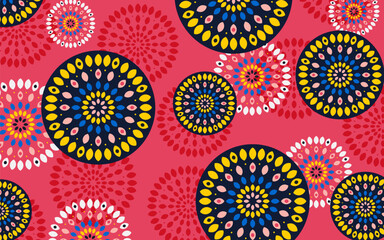 Floral abstract circular pattern for printing on pillows, carpets, interior design. Colored circles on a pink background create a bright Indian motif. Vector.