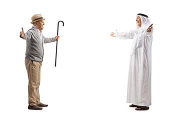 Arab man in traditional muslim clothes walking towards a senior man with arms wide open