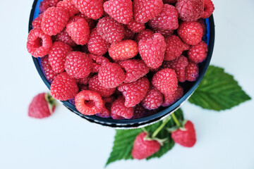 Bowl with natural ripe organic berries, top view with copy space