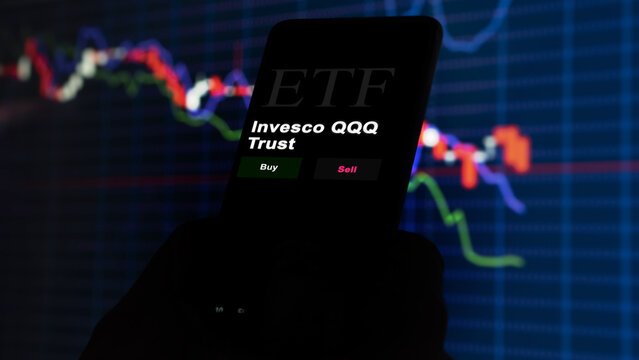 March 2023, An investor analyzing an etf fund Invesco QQQ Trust.