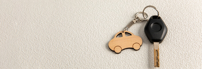 car keys on the wooden table