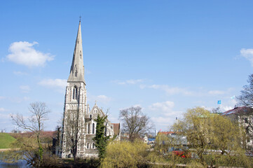 Cityscape of Copenhagen with Saint Albans church with some clouds in the sky