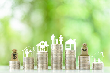 Family tax benefit, inherit tax, property or estate and household tax concept : Tax bag, family and...