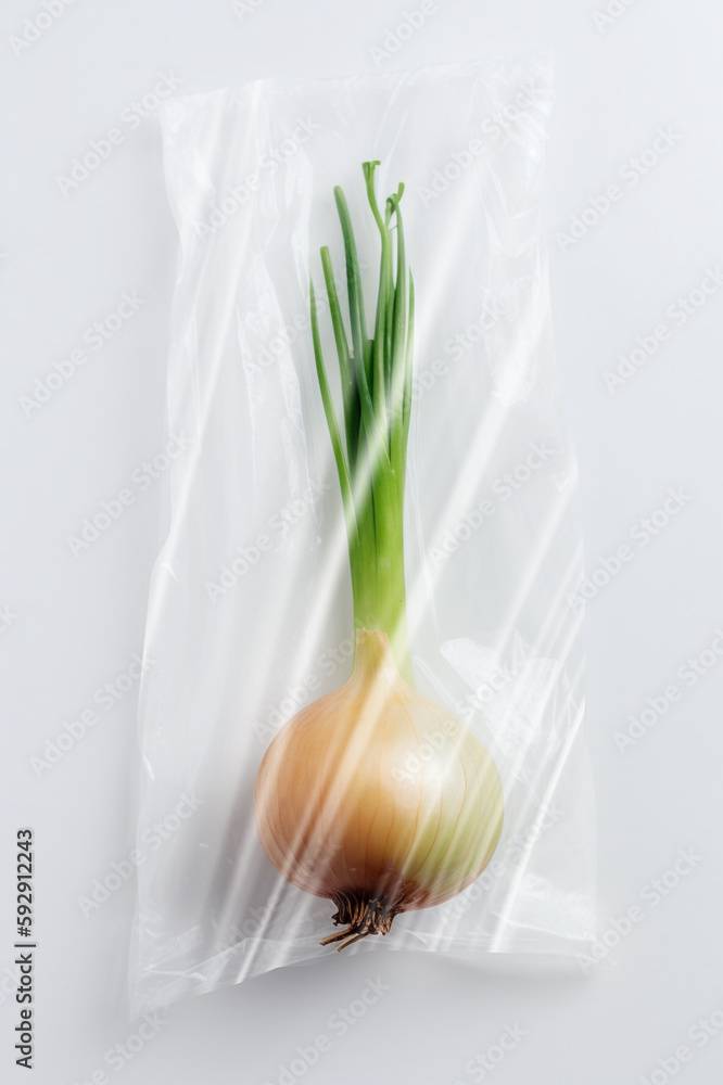 Wall mural Onion in Plastic Bag. Ai generative