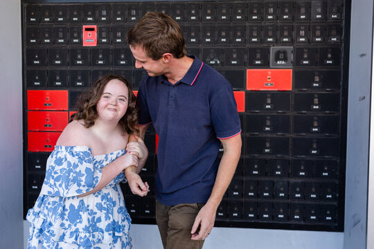 community access for person with a disability - happy teen with NDIS provider support person