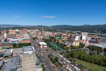 Fototapeta na wymiar A panoramic view of downtown Pietermaritzburg, Kwazulu-Natal, with hills in the background.