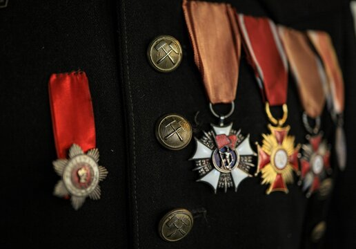 Closeup shot of the medels on the mining uniform