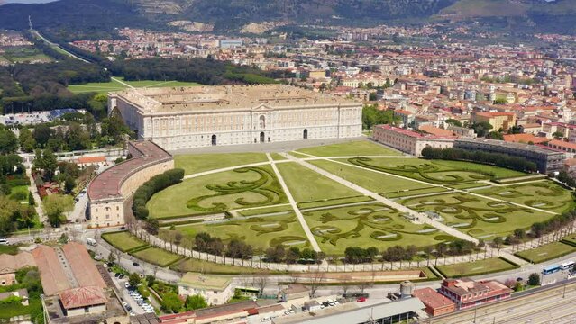 Aerial view of the Royal Palace of Caserta also known as Reggia di Caserta. It is a former royal residence with large gardens in Caserta, near Naples, Italy. It is the main facade of the building.