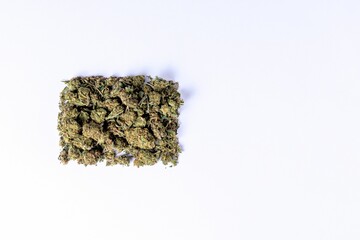 Top view of marijuana on a white background