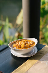 Famous Thai food on the wooden table, Pha-ngaeng Khai