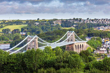 View over the Menai Suspension Bridge. Connecting the island of Anglesey with mainland Wales, the bridge was designed by Thomas Telford and opened in 1826.