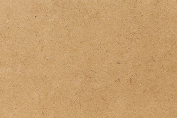 Pressed beige chipboard texture.