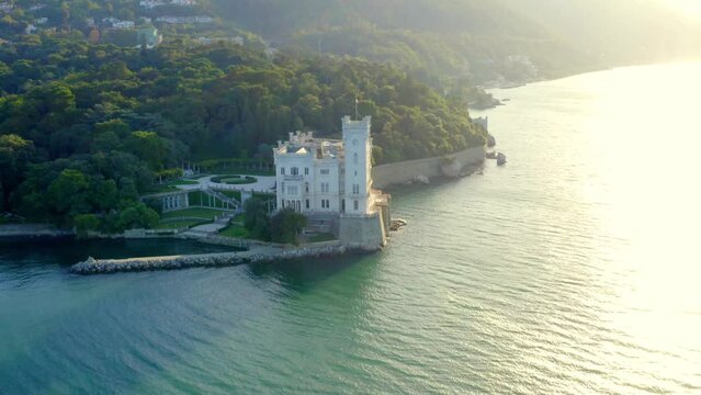 Aerial of the Miramare Castle in the scenic Gulf of Trieste captured in northeastern Italy