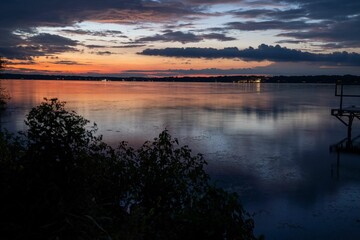 Fototapeta na wymiar Beautiful view of a lake under a sunset sky.