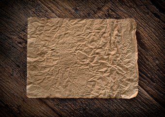 vintage grunge burnt paper at dark wooden background