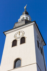 White tower of the old lutherian church in Wuppertal, Germany