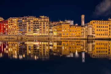 Deurstickers Aerial view of cityscape Florence surrounded by buildings in night © Mihnea Paunescu/Wirestock Creators