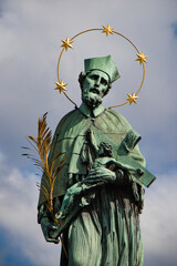 Detail view of statue St. John of Nepomuk on Charles bridge, Prague. Czech Republic.