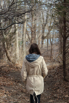 woman walking in the woods