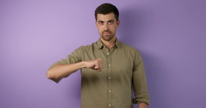 cheerful handsome guy learning to chat with deaf people, education, happy man in shirt talking with gestures, looking at camera