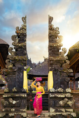 Indonesian girl with traditional costumn dance in bali temple