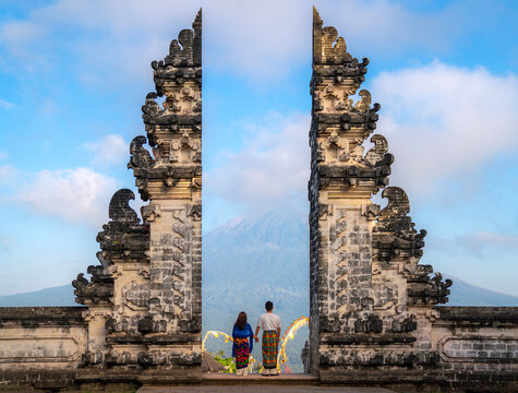 Indonesia gate in temple in Bali with indonesian woman