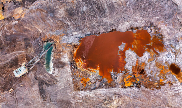 Giant of the Earth: An Enormous Excavator Extracting Titanium Ore