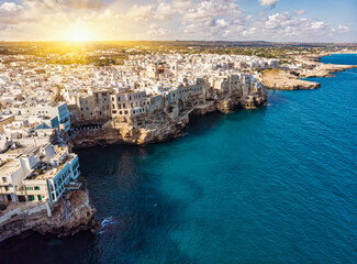 Aerial view of Polignano a Mare old town, a small city along the coast facing the Mediterranean...