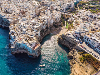 Aerial view of Polignano a Mare old town, a small city along the coast facing the Mediterranean...