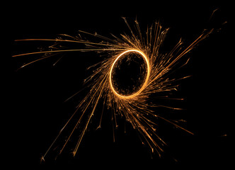 Sparkling circle of bengal fire on black background