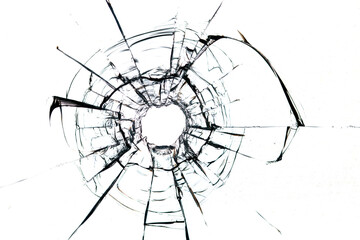 Cracks in the glass from a bullet on a white background
