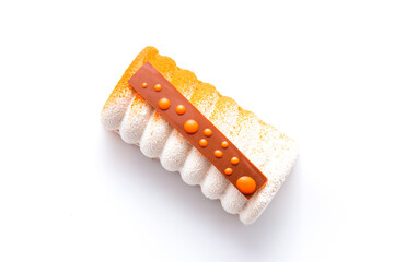 Beautiful white-orange dessert roll on a white background