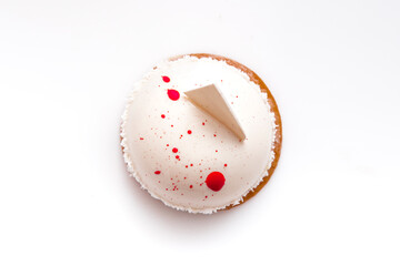 A beautiful round white and pink cake on white background